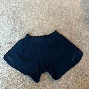 4” navy Hotty hot Lululemon shorts. Also they’re in good condition.